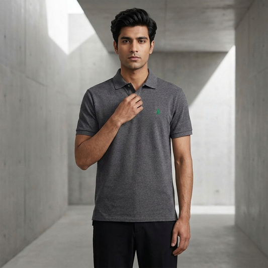 Model wearing a Barclay Ralph Lauren polo shirt with white trousers