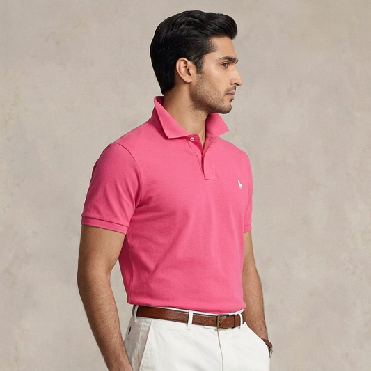 Model wearing a Hot Pink Ralph Lauren polo shirt in a colorful setting