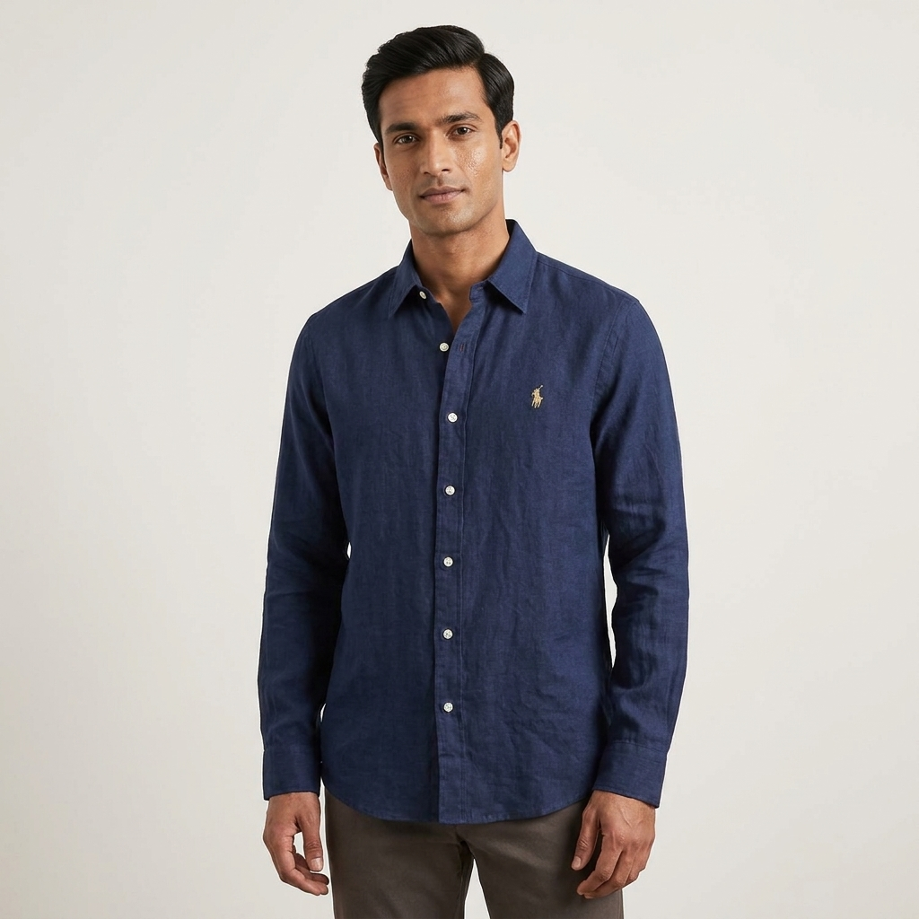 Model wearing a navy Ralph Lauren 100% linen washed shirt in an editorial setting