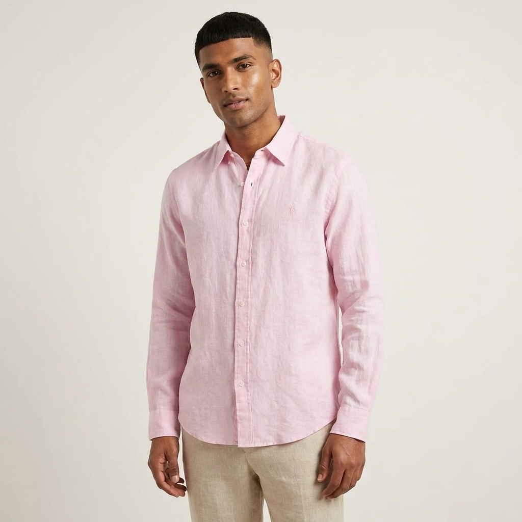 Model wearing a pink Ralph Lauren 100% linen washed shirt in an editorial setting