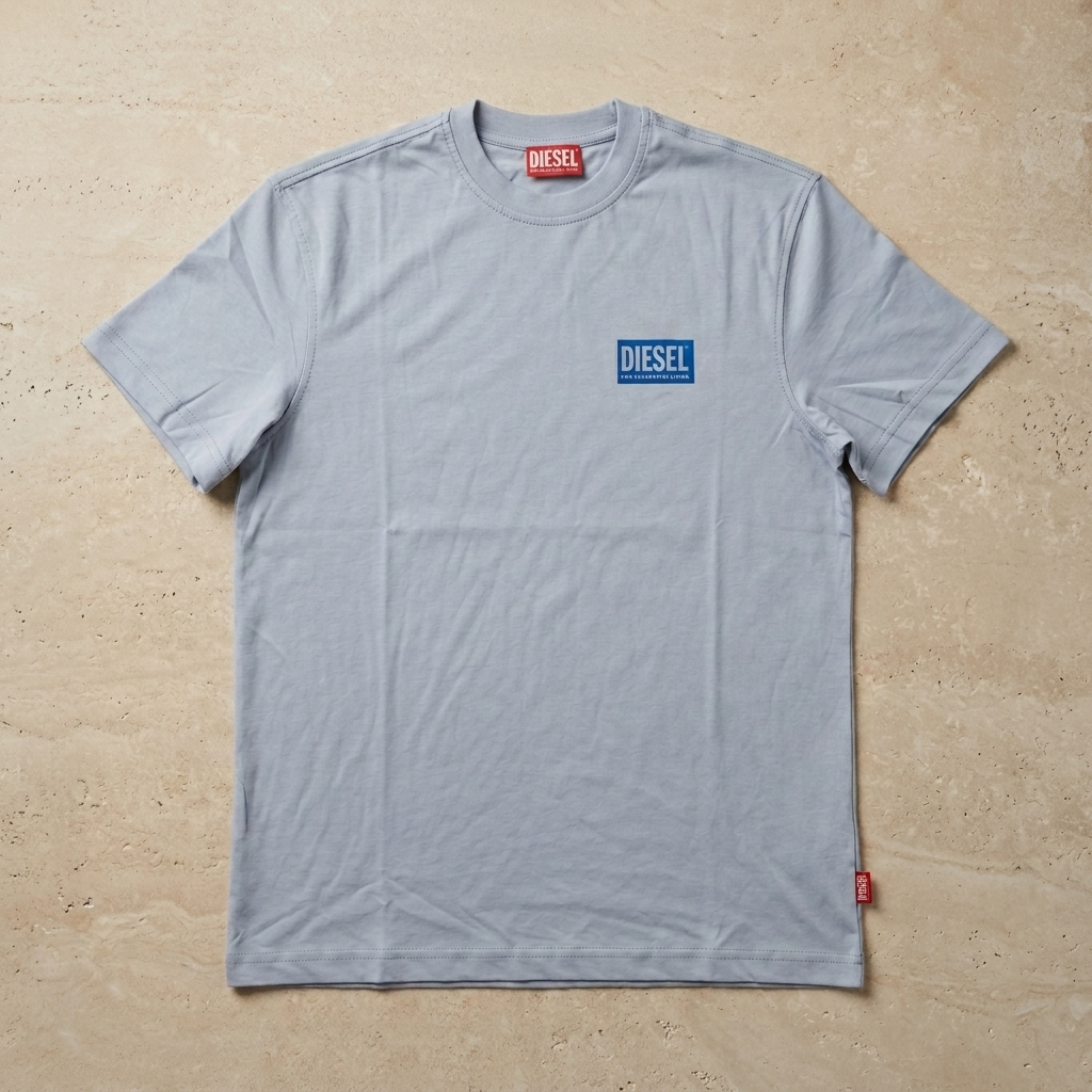 Model wearing grayish blue Diesel printed t-shirt front view