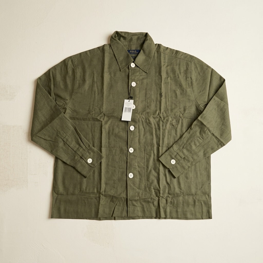 Olive button-up overshirt with three patch pockets, long sleeves, buttoned cuffs and embroidered chest motif