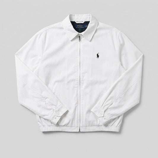 White micro polyester zip-up jacket with point collar, buttoned cuffs and black embroidered chest motif