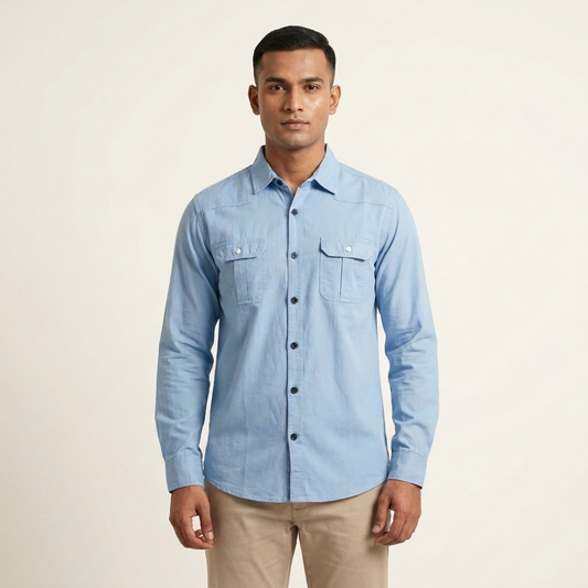 Man wearing a periwinkle blue 100% Oxford cotton shirt