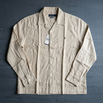 Front view of a man wearing a beige Ralph Lauren linen blend shacket